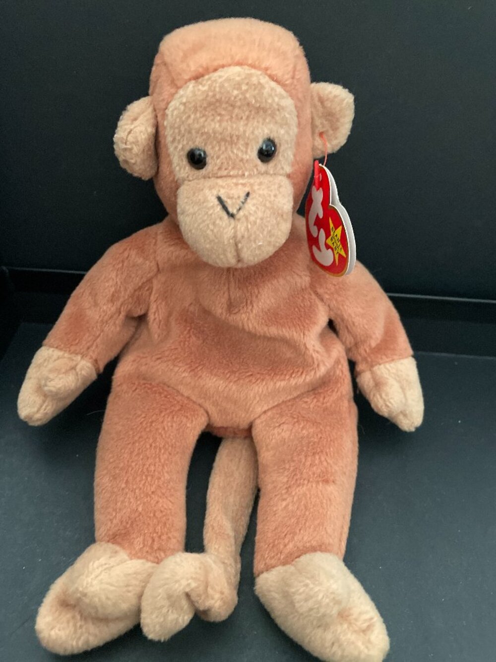 Bongo the Monkey, a retired 1995 plush toy from Ty Beanie Babies-NWT
